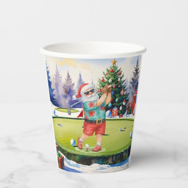 Santa Claus is golfing on Christmas golf course  Paper Cups (Front)