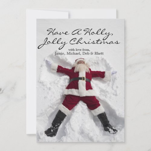 Santa Claus making snow angel billboard Holiday Card