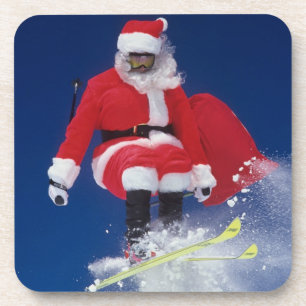 Santa Claus on skis jumping off a cornice at Drink Coaster