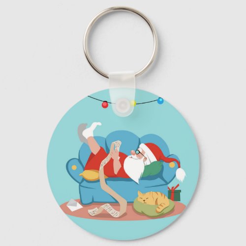 Santa Claus on the couch in pajamas Keychain