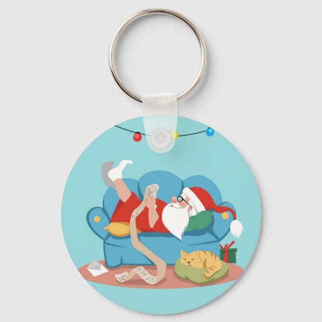 Santa Claus on the couch in pajamas Keychain (Front)