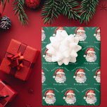 Santa Claus Personalized Green Kids Christmas Wrapping Paper Sheets<br><div class="desc">Customize these nostalgic from Santa Claus green wrapping paper sheets with your own personalized text with your kids name in white script. This beautiful old fashioned drawing of Santa's red hat and white beard is the perfect holiday gift wrap for your children's presents under the tree on Christmas day.</div>