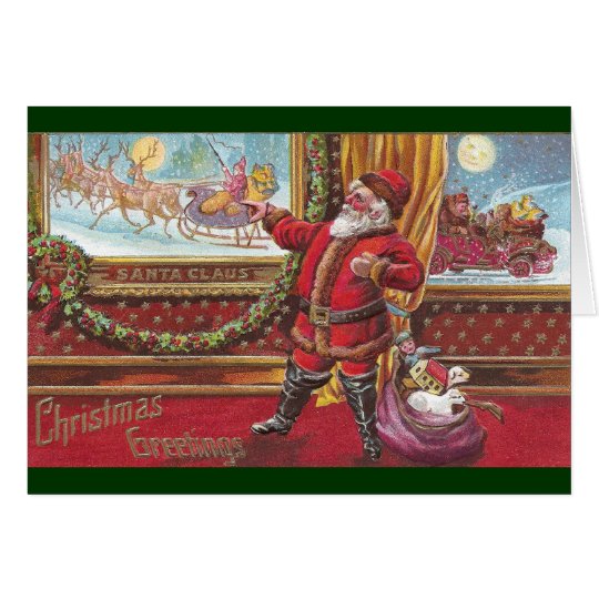 Santa Claus Points Proudly at His Portrait Card