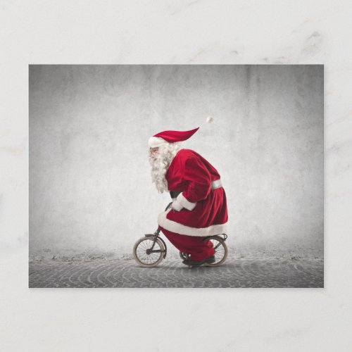 Santa Claus Rides A Bicycle Holiday Postcard