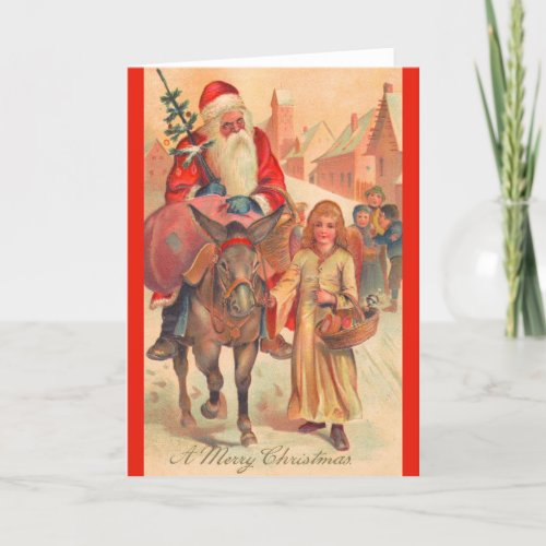 Santa Claus riding a donkey Merry Christmas Holiday Card