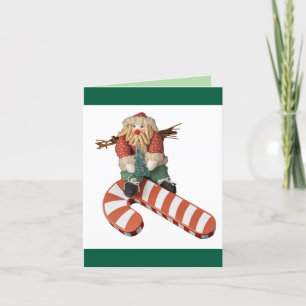 Santa Claus slides down a candy cane Christmas Holiday Card