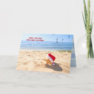Santa Claus starfish in beach sand Holiday Card