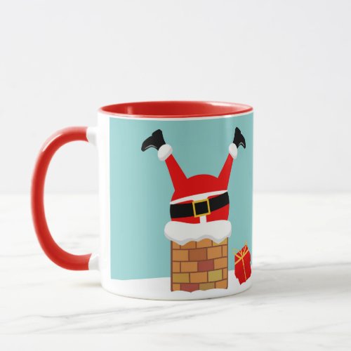 Santa Claus stuck in the chimney on the roof Mug