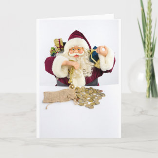 Santa Claus with gifts and money coins Holiday Card