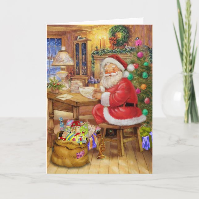 Santa Claus working on his desk Holiday Card (Front)