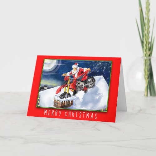 Santa Clause delivering a dirt bike for Christmas Holiday Card