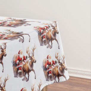 Santa Clause with a reindeer pulling his sleigh Tablecloth