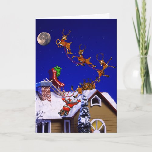 Santa crashing on the rooftop holiday card