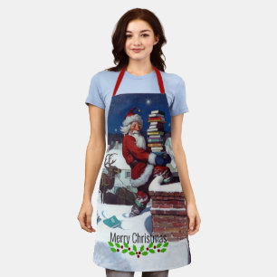 Santa delivering armload of books by Wyeth Apron