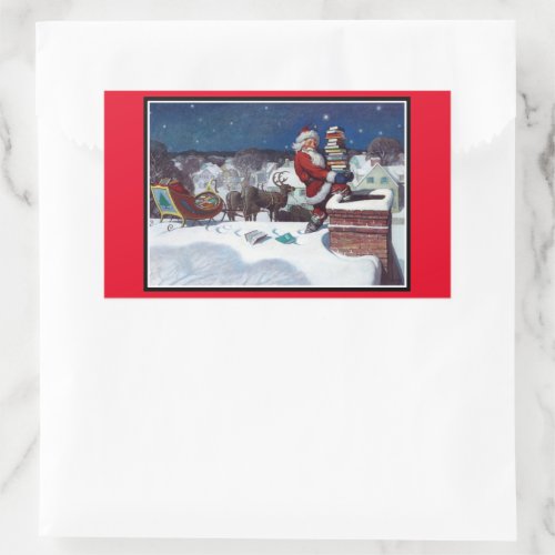 Santa delivering armload of books rectangular sticker