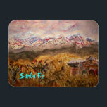 santa fe snow magnet<br><div class="desc">shows cool adobe style house near santa fe and beautiful snow on the nearby mountains ! also "Santa Fe" slogan</div>
