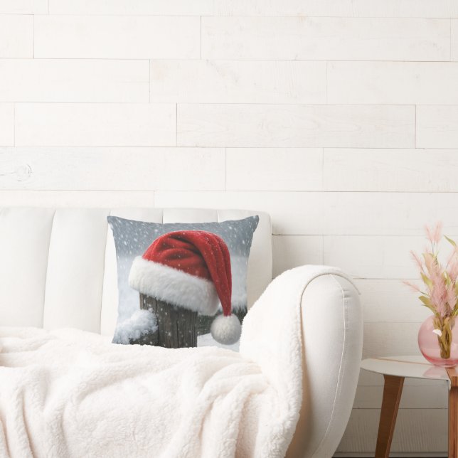 Santa Hat On a Snowy Fence Post Throw Pillow (Couch)