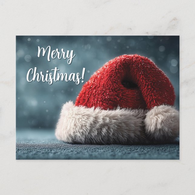 Santa Hat Resting on Snowy Surface with Greeting Holiday Postcard (Front)
