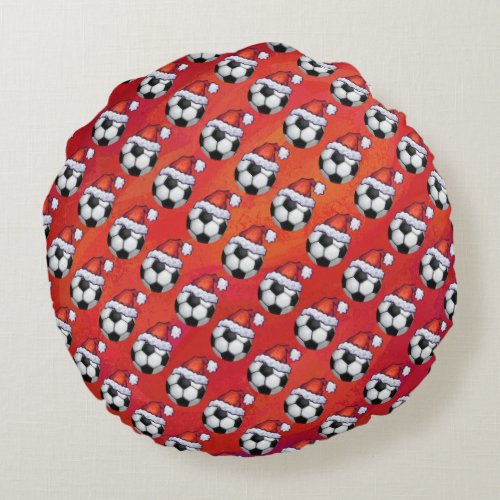 Santa Hat Soccer Ball Pattern on Red Round Pillow