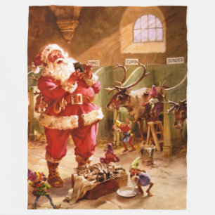 Santa in the Reindeer Barn Fleece Blanket