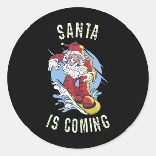 Santa is coming by snowboard classic round sticker