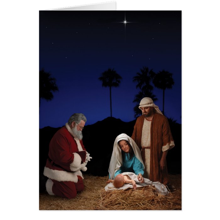 Santa Kneeling at Nativity Greeting Cards