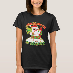 Santa On Beach Surfboard  Christmas In August T-Shirt