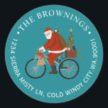 Santa Riding a Bike Christmas Holiday Address Classic Round Sticker<br><div class="desc">Return address Santa on a bicycle with name and address around the circle</div>