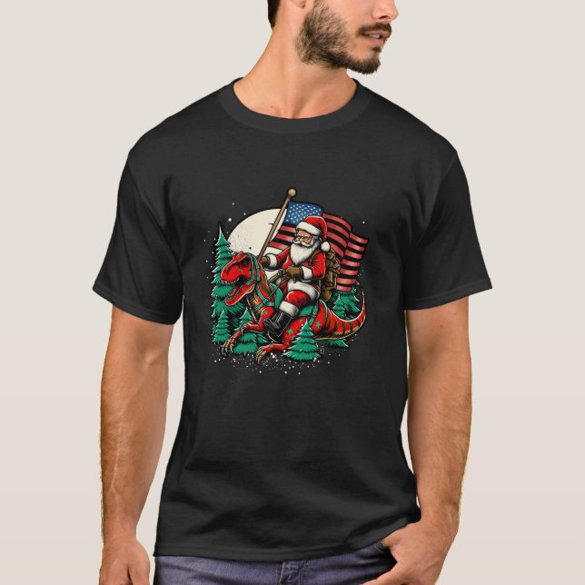 Santa Riding Dinosaur USA Flag T Rex Christmas T-Shirt (Front)