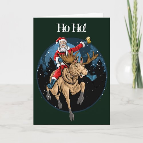 Santa Riding Moose Drinking Beer Holiday Card