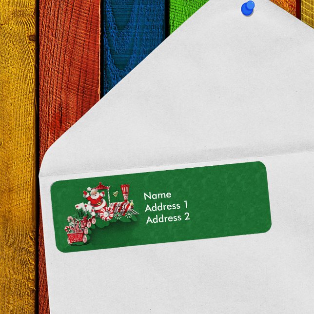 Santa Riding Peppermint Candy Christmas Train Label (Santa Claus on train with candy wheels and candy canes on green return address labels.)