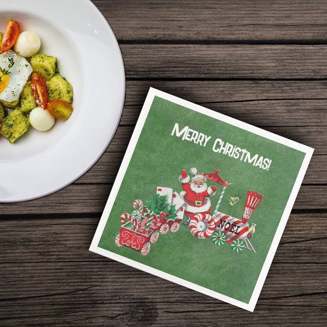 Santa Riding Red White Christmas Train Dark Green Paper Dinner Napkins (Santa riding red white train with candy canes and letters on Merry christmas green paper napkins.)