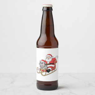 Santa Riding Sleigh with a Moo Deng Baby Hippo Beer Bottle Label