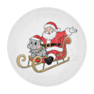 Santa Riding Sleigh with a Moo Deng Baby Hippo Cutting Board