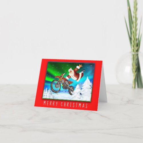 Santa showing off his freestyle motocross skills holiday card
