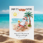Santa Tropical Beach Vacation Christmas Holiday Card<br><div class="desc">Send warm holiday wishes from the beach with this fun “Baby It’s Warm Outside” Christmas card featuring Santa on a vacation! Santa lounges in Hawaiian shorts under a palm tree decorated with ornaments, enjoying a beer and a sunny day by the ocean. The greeting reads “May your Christmas be Merry...</div>