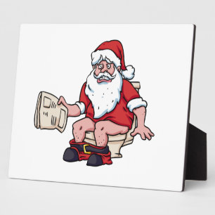 Santa Using Toilet Plaque