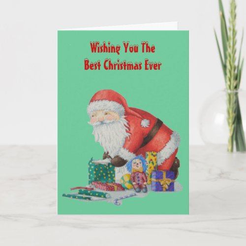 santa wrapping toys and gifts for Christmas Holiday Card