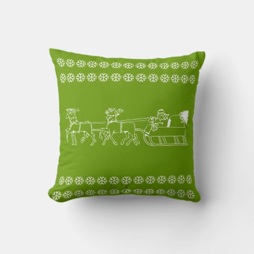 Santas reindeer  tree in white on a green pillow