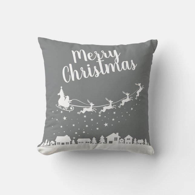 Santa's sleigh & reindeers flying above the city throw pillow (Front)