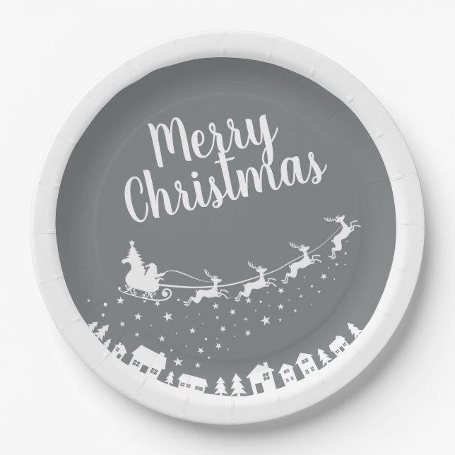 Santa's sleigh silhouette flying above the houses paper plates (Front)