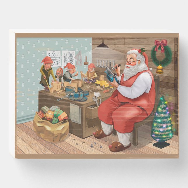 Santa's Workshop Wooden Box Sign (Santa Claus sits at a wooden table in his workshop, surrounded by cheerful elves!)