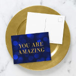 Sapphire Blue Bokeh Lights Gold You Are Amazing Postcard<br><div class="desc">Chic motivational postcard featuring the words "You Are Amazing" in faux gold foil against a sapphire blue bokeh lights pattern background. To add text to the the card click the "Customize" button. *Please note that the Zazzle Watermark that appears in the zoom preview will NOT appear on the final printed...</div>
