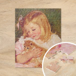 Sara Holding a Cat | Mary Cassatt Jigsaw Puzzle<br><div class="desc">Sara Holding a Cat (1908) by American impressionist artist Mary Cassatt. Original fine art painting depicts a portrait of a little girl wearing a pink dress and holding a kitten. 

Use the design tools to add custom text or personalize the image.</div>