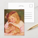 Sara Holding a Cat | Mary Cassatt Postcard<br><div class="desc">Sara Holding a Cat (1908) by American impressionist artist Mary Cassatt. Original fine art painting depicts a portrait of a little girl wearing a pink dress and holding a kitten. 

Use the design tools to add custom text or personalize the image.</div>
