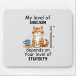 Sarcastic Cat – Funny Orange Art Mouse Pad<br><div class="desc">Unleash the sass with this 'My Level of Sarcasm Depends on Your Level of Stupidity' mousepad! Featuring a cute orange cat with a hilariously witty expression, this artwork is perfect for those who love clever humor and feline charm. A must-have for cat enthusiasts and sarcasm experts alike, it’s the ideal...</div>