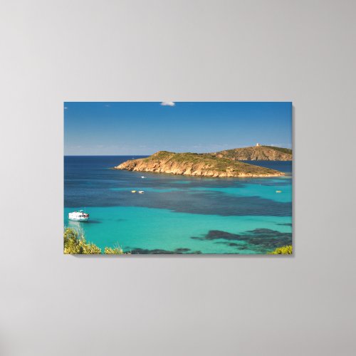 Sardinian clear blue sea  sky w boats and cliff canvas print