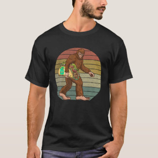 Sasquatch Bigfoot Holding a Taco Funny Men Cinco d T-Shirt