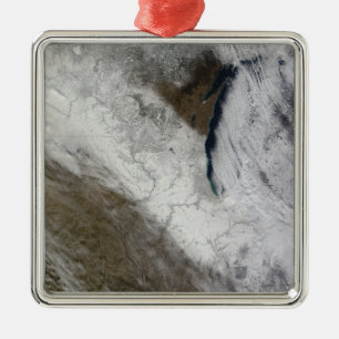 Satellite view of snow and cold metal ornament