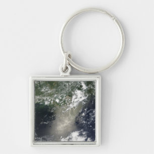 Satellite view of streaks and ribbons of oil keychain